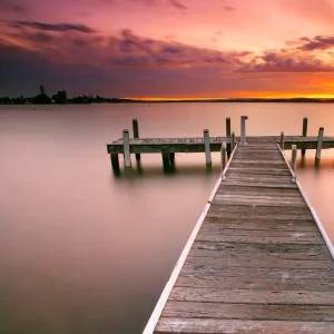 Pier in Lake Macquarie at sunset, Australia