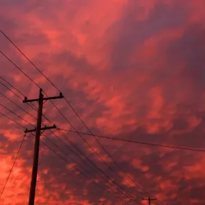 power pole and lines with clouds power pole and lines with clouds