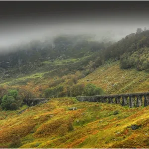 A railway viaduct in mist, near Callander, Scottish highlands