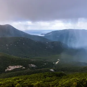 Rain cloud passing by at the top of Mount Oberon at Wilsons Promontory, Victoria Rain cloud passing by at the top of Mount Oberon at Wilsons Promontory, Victoria
