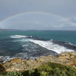 Rainbow over coast and ocean. Australia Rainbow over coast and ocean. Australia