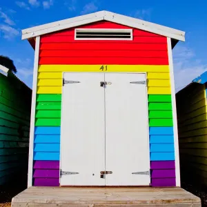 Rainbow colored beach hut