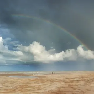 Rainbow over Lee Point Beach walkers