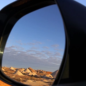 Reflection in car mirror in opal mining area of Coober Pedy in the South Australian Outback