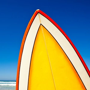 Retro surf board at beach, Australia