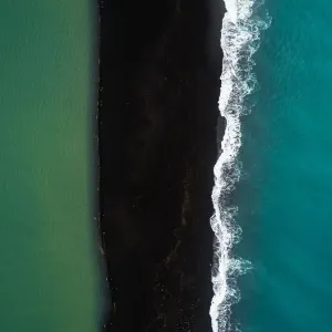 River, black beach and ocean, Iceland River, black beach and ocean, Iceland