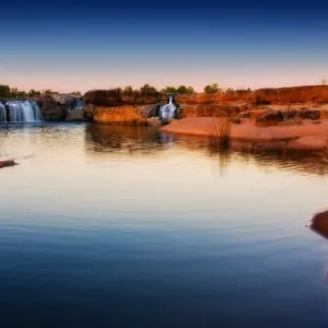 River waterfalls with red earth River waterfalls with red earth