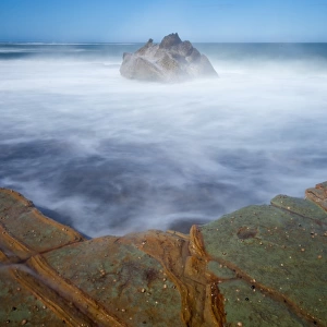Rock patterns and swirling water
