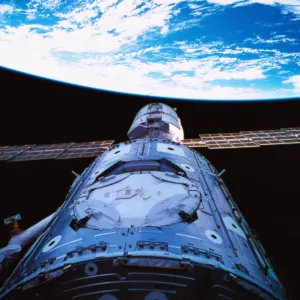 A satellite orbiting above earth A satellite orbiting above earth