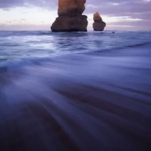 Two sea stacks at Gibsons Steps and a receding wave, Great Ocean Road, Victoria, Australia