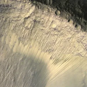 Seasonal Changes in Dark Marks on an Equatorial Martian Slope Seasonal Changes in Dark Marks on an Equatorial Martian Slope