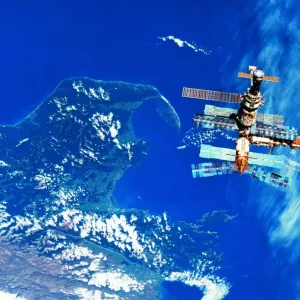 A space station orbiting above earth A space station orbiting above earth
