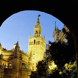 Spain, Andalucia, Seville, cathedral exterior, low angle view, dusk