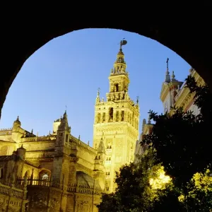 Spain, Andalucia, Seville, cathedral exterior, low angle view, dusk