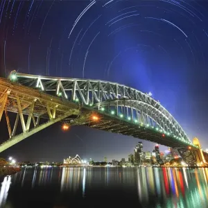 Star trails print over Sydney Harbour bridge and Opera House