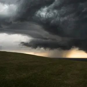 Storm front over paddock Storm front over paddock