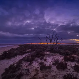 Stormy dawn light approaching Lake Tyrrell, which is situated near the town of SeaLake in the Wimmera District of Victoria, Australia