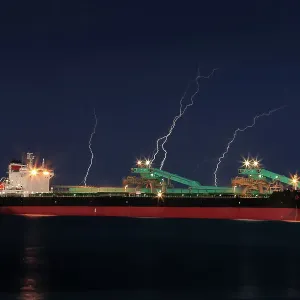 Stormy dramatic sky with lightning breaking over a ship at Port Lincoln. Eyre Peninsula. South Australia Stormy dramatic sky with lightning breaking over a ship at Port Lincoln. Eyre Peninsula. South Australia