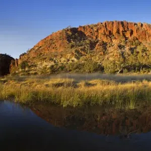 Sunrise at Glen Helen Gorge with Finke River, West MacDonnell Ranges, Northern Territory Sunrise at Glen Helen Gorge with Finke River, West MacDonnell Ranges, Northern Territory