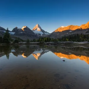 Sunrise at Mount Assiniboine with reflection