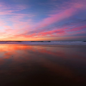 sunrise reflection at beach