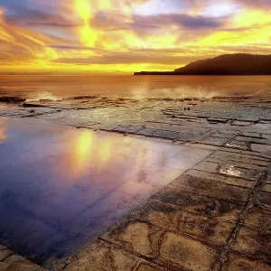 Sunrise at the Tessellated Pavement, Lufra, Eaglehawk Neck, Tasman Peninsula of Tasmania Sunrise at the Tessellated Pavement, Lufra, Eaglehawk Neck, Tasman Peninsula of Tasmania