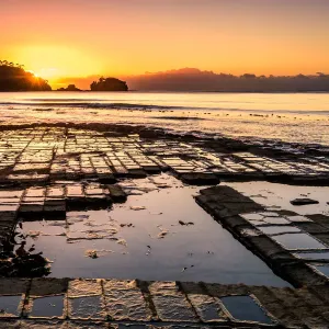 Sunrise at Tessellated Pavement at Tasman Peninsula, Tasmania Sunrise at Tessellated Pavement at Tasman Peninsula, Tasmania