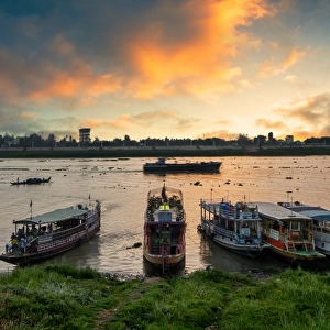 Sunrise View of Mekong River with Passenger Ferries at Siem Reap, Cambodia