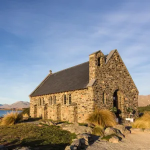 Sunset over the Church of the good Shepherd and Lake Takepo in New Zealand