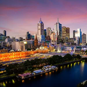Sunset over city skyline of Melbourne downtown, Princess Bridge