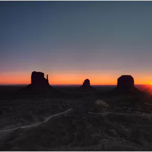 Sunstar on the horizon, Monument valley, Arizona, USA