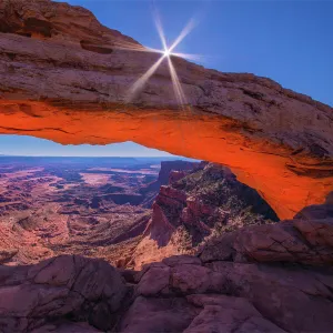 Sunstar and morning light at Mesa Arch, Canyonlands National Park, Utah