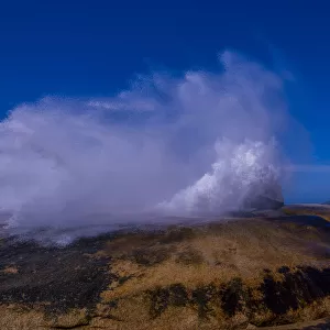 Thundering blowhole erupts on the Bicheno coastline, East coast of Tasmania