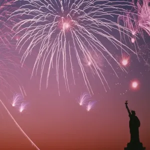 USA, New York City, fireworks on july 4th with silhouette of Statue of Liberty USA, New York City, fireworks on july 4th with silhouette of Statue of Liberty