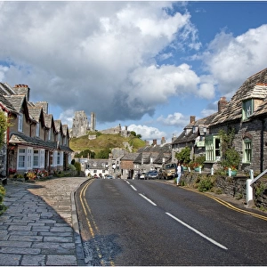 A view down the high Street of Corfe Castle, Isle of Purbeck, Dorset, England