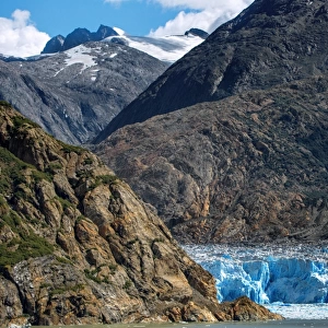 View of South Sawyer Glacier with Alaskan Mountains in Tracy Arm, Alaska, United States of America