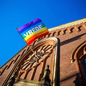 Vrede (PEACE) Wordings on a LGBT Flag Outside a Church, Hague, Netherlands