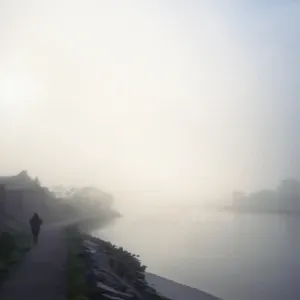 Walker in fog