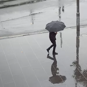 Walker in the rain