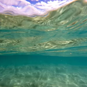 Water patterns from underneath the wave, looking up to the ocean surface