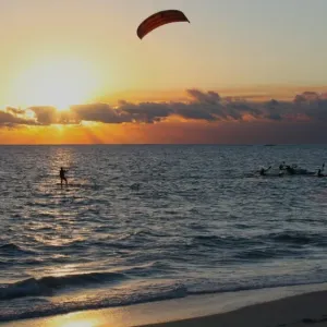 Water sports at a Perth beach during the summer at sunset Water sports at a Perth beach during the summer at sunset