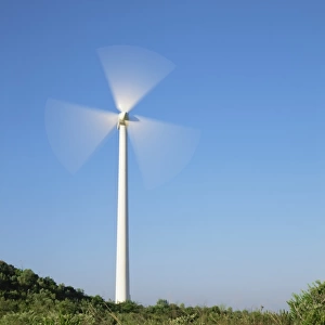 Wind turbine in rural landscape