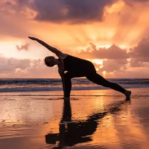 Silhouetted Yoga Print at Sunrise Silhouetted Yoga Print at Sunrise