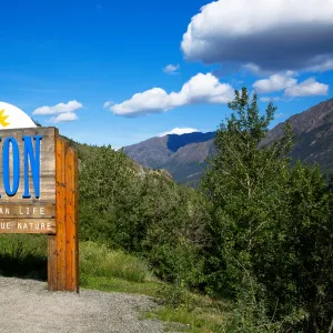 A Yukon Welcome Sign on the Border of Alaska with the Northwest and Dempster Highway, Yukon Territory, Canada