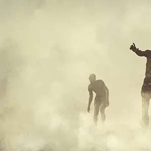 Zombie men approaching through mist