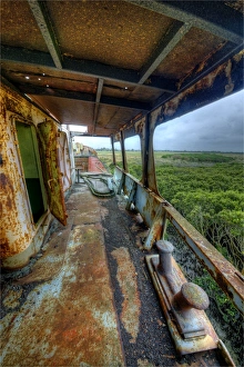 An abandoned and derelict old fishing Trawler lies deep in mangrove swamps near Tooradin, Western-port bay, Victoria An abandoned and derelict old fishing Trawler lies deep in mangrove swamps near Tooradin, Western-port bay, Victoria