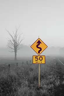 Abstract yellow road sign on monochrome background