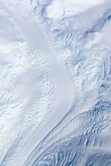 Aerial image of a glacier and crevasses, Antarctica