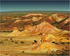 An Aerial view of the Australian outback over the Painted desert, showing the vibrant colours of the Landscape