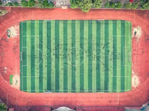 Shihan Shan Prints: Aerial view of the football court in Sichuan University in Chengdu, China